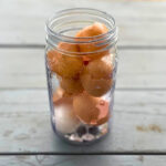 broken egg shells in a glass jar