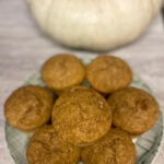 stack of pumpkin muffins on a plate