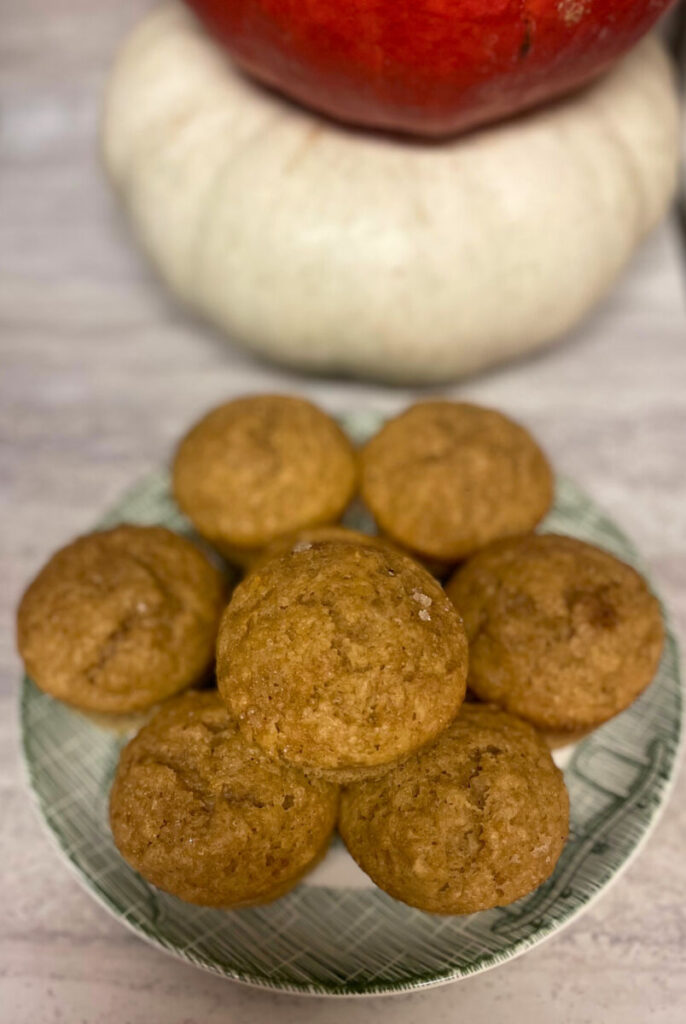 stack of pumpkin muffins on a plate