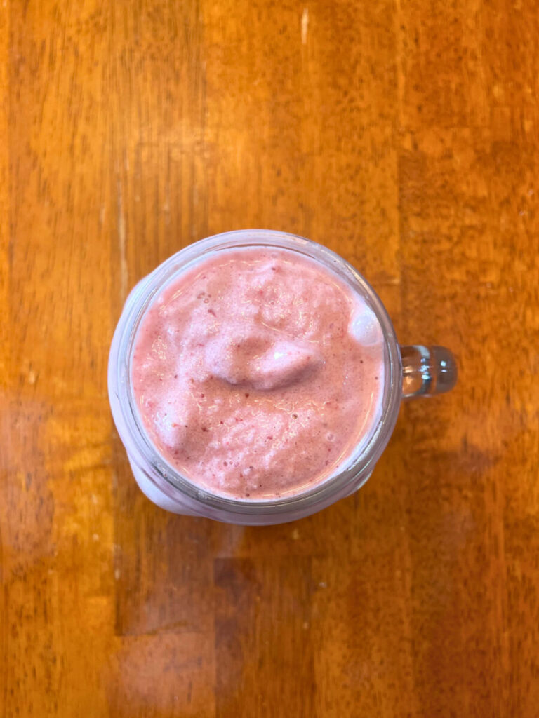pink smoothie in a glass jar