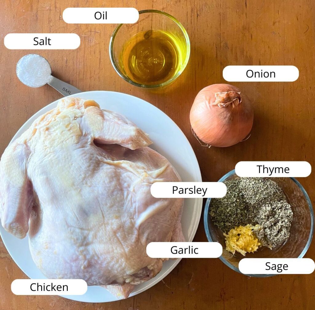 ingredients for making a whole chicken laid out