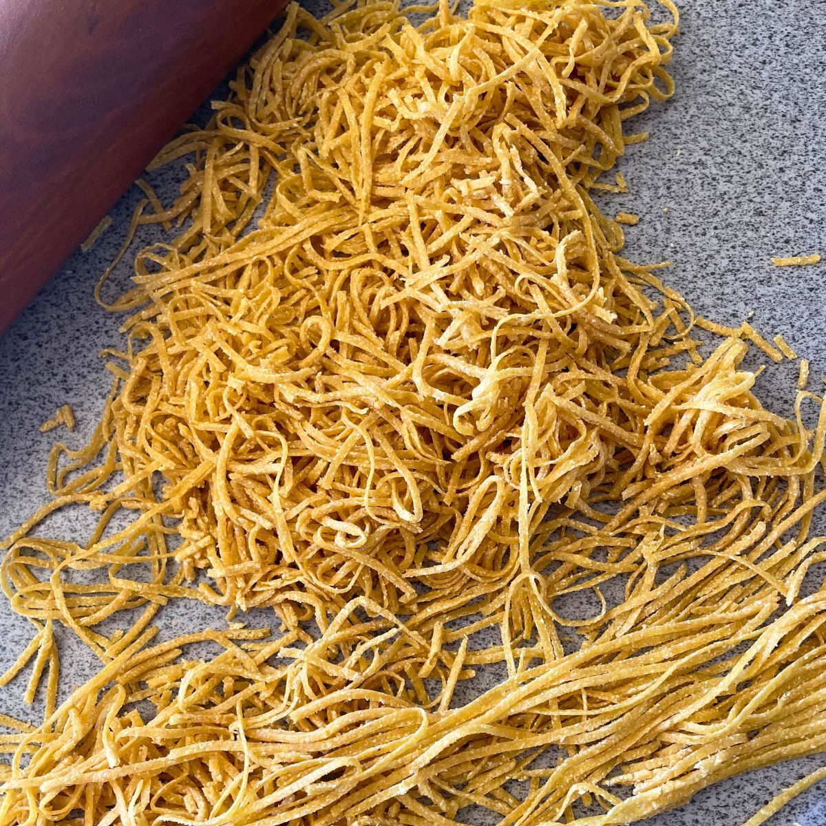 homemade pasta laid out on a table