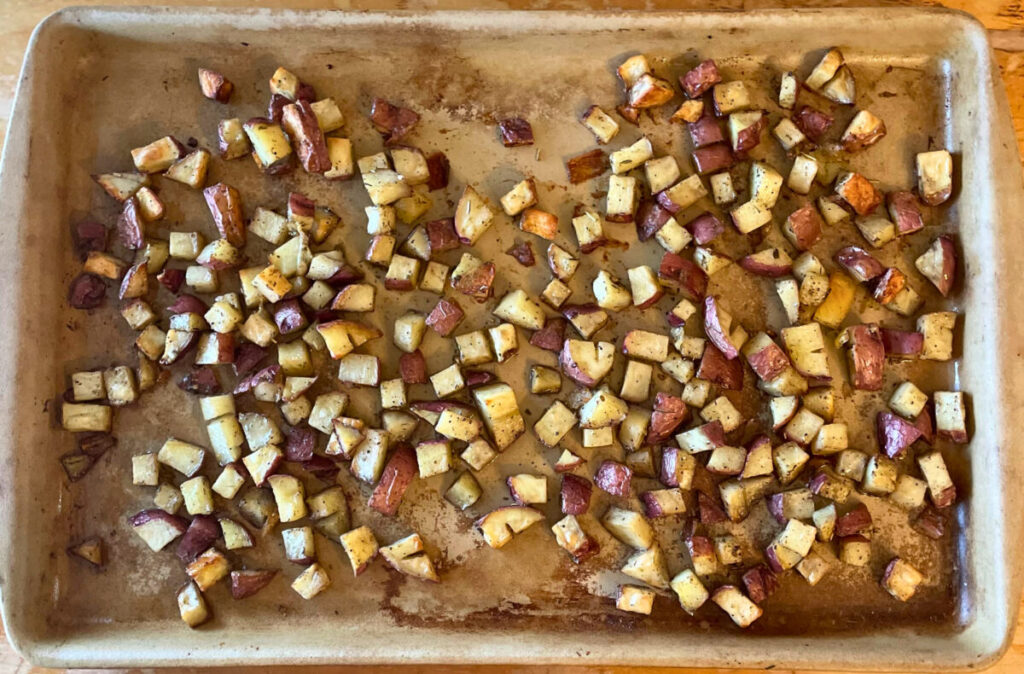 roasted red potatoes on a baking stone